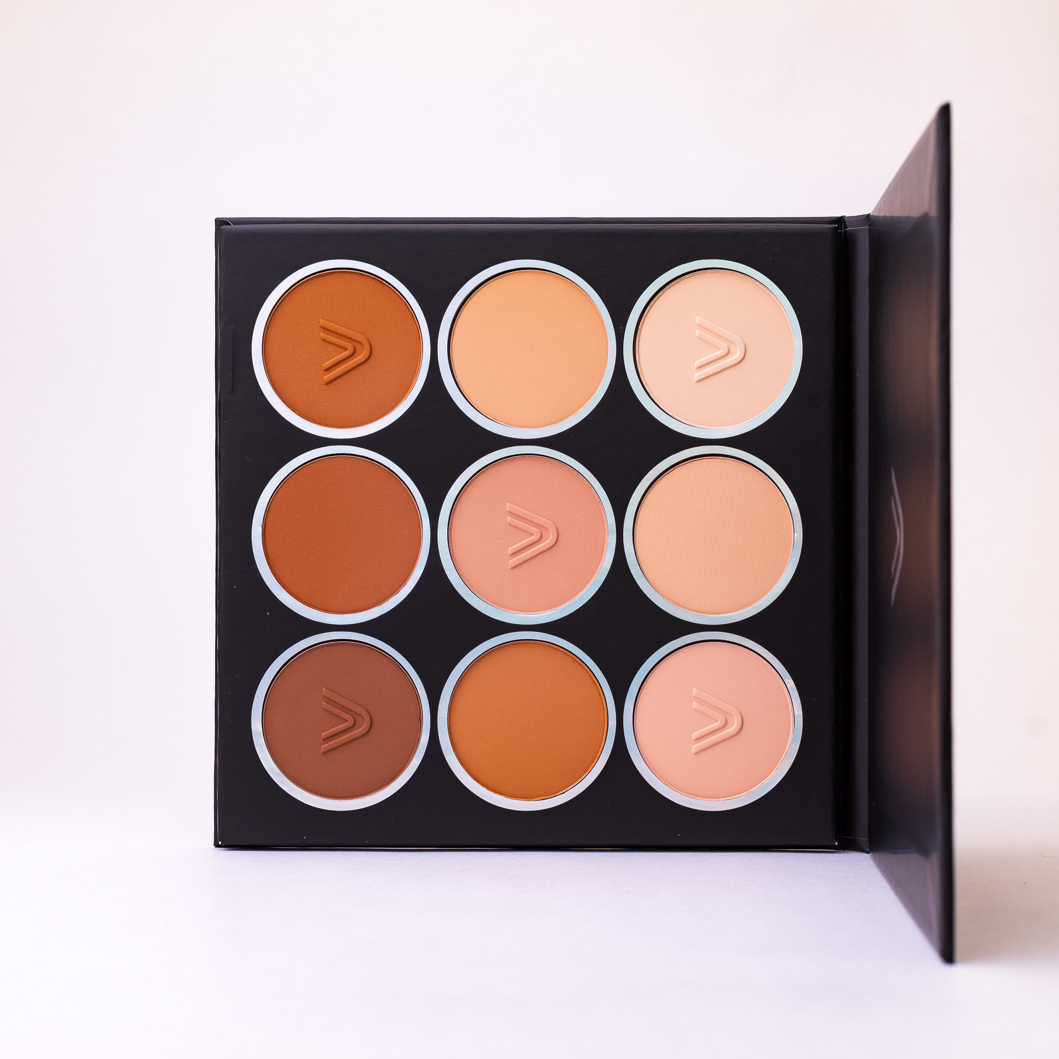 Paleta de polvos compactos x9	Atenea Natural Touch Powder  19,8g